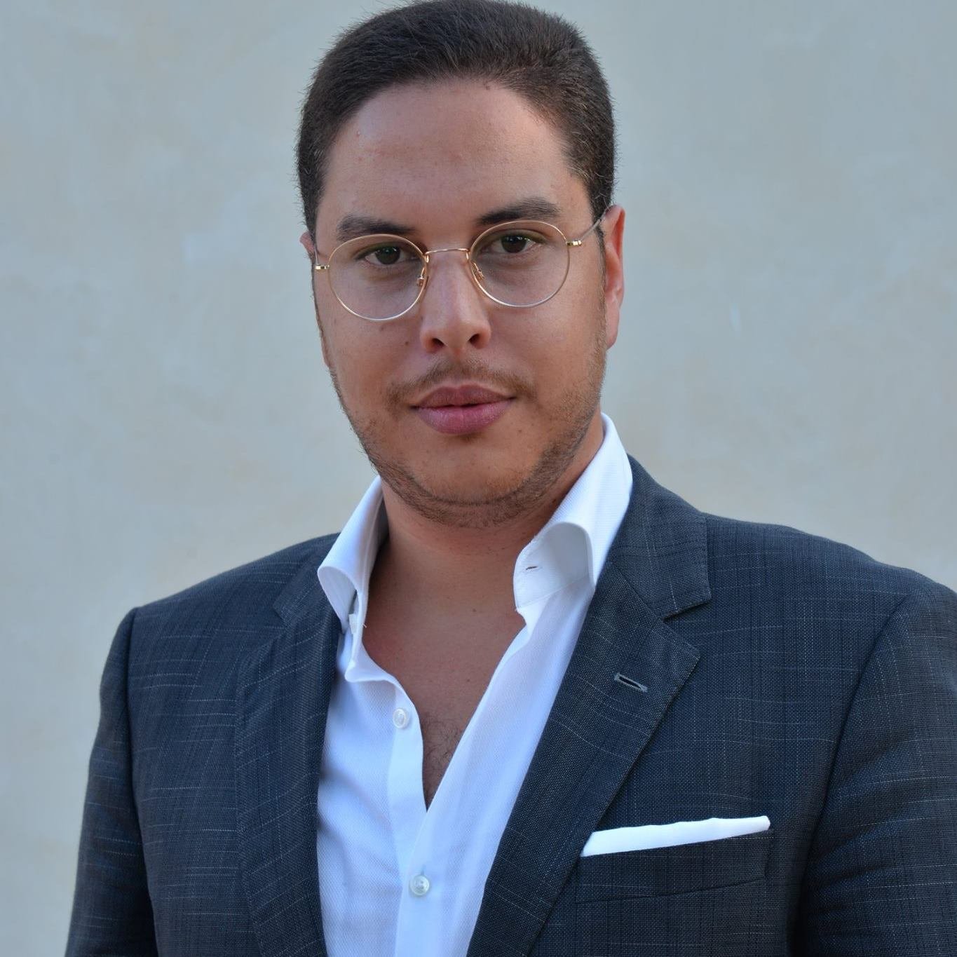 Hamza Benzekri — Antique Carpets Studio